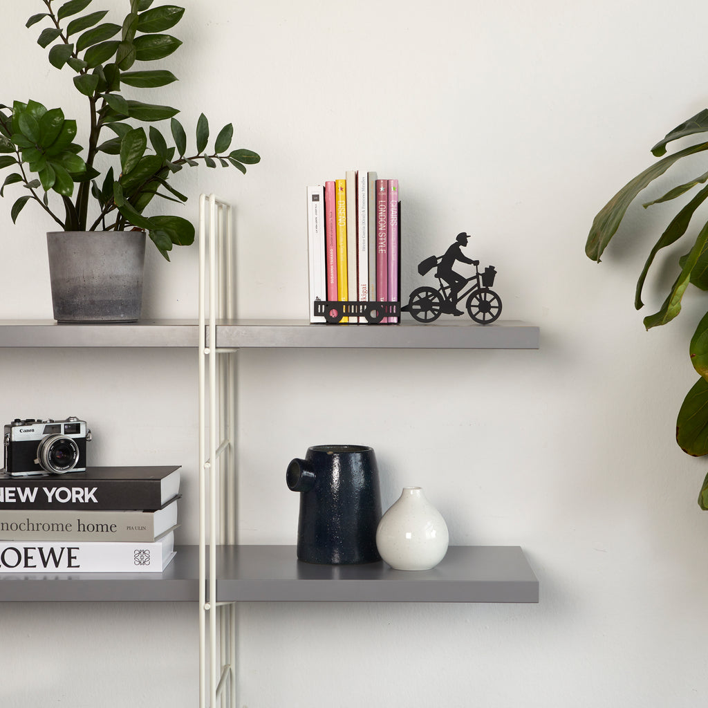 Sujetalibros Postman