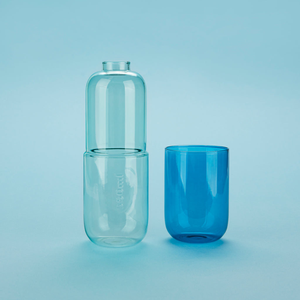 Water Pill Bottle and Drinking Glass