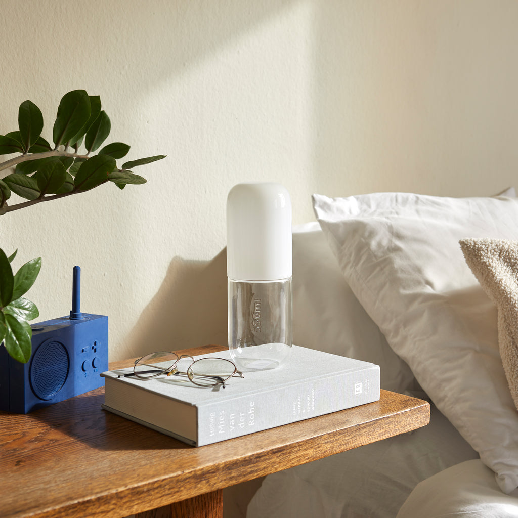 Water Pill Bottle and Drinking Glass